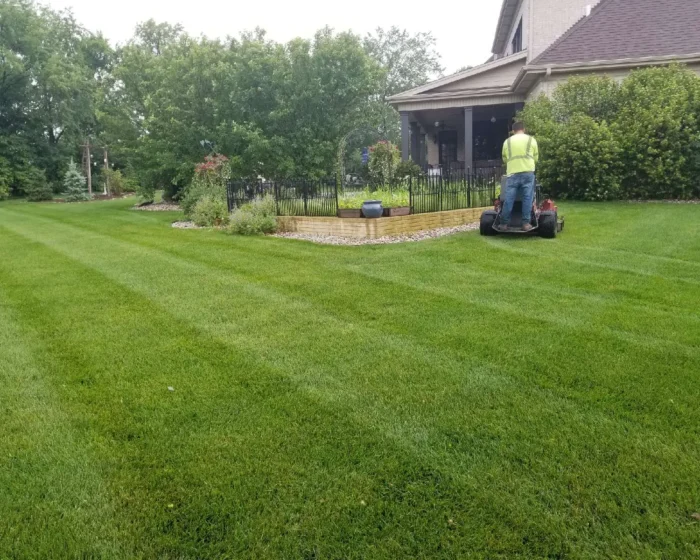 Landscaping team working on comercial garden